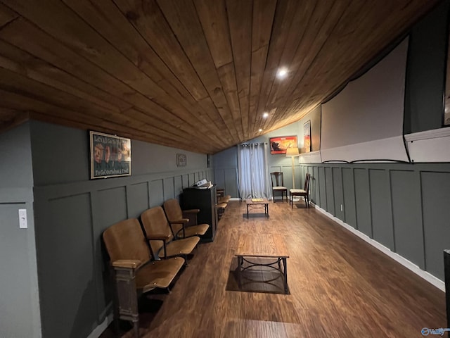 living area featuring recessed lighting, a decorative wall, wood ceiling, vaulted ceiling, and wood finished floors