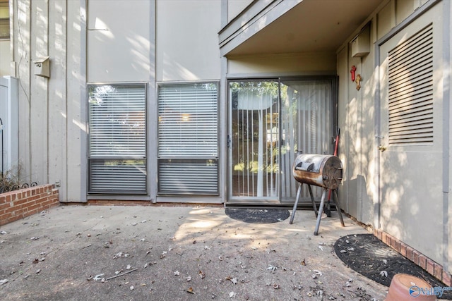 property entrance with a patio area