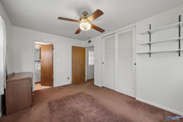 4109 Coffee Cir SW, Huntsville, AL 35805 - unfurnished bedroom featuring carpet flooring, baseboards, a closet, a ceiling fan, and connected bathroom