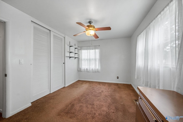 4109 Coffee Cir SW, Huntsville, AL 35805 - unfurnished bedroom with carpet, a closet, baseboards, and a ceiling fan