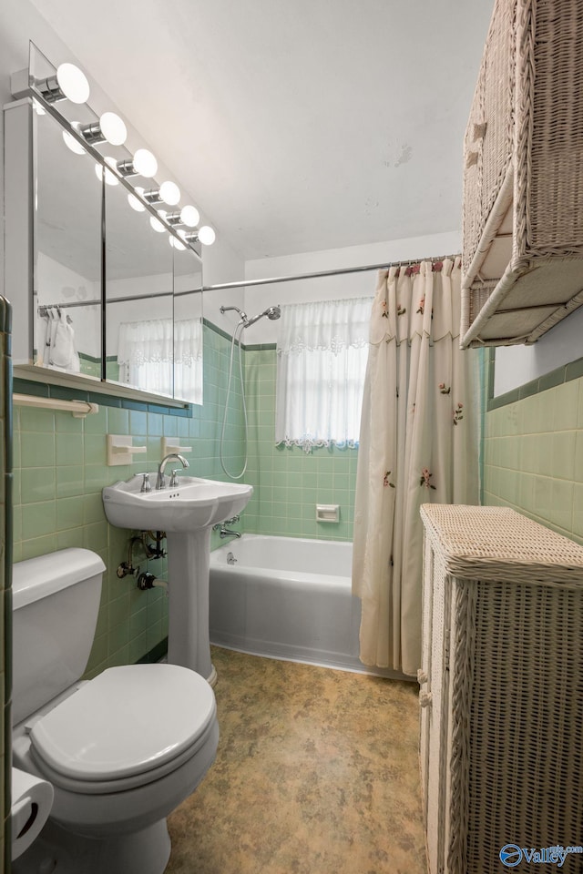 4109 Coffee Cir SW, Huntsville, AL 35805 - full bath with tile walls, toilet, shower / bathtub combination with curtain, and a sink