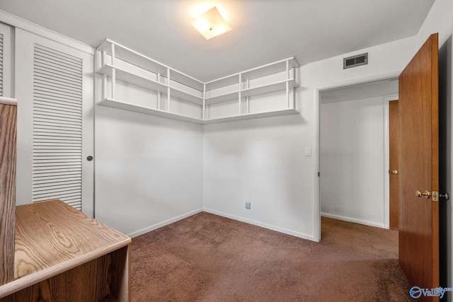 4109 Coffee Cir SW, Huntsville, AL 35805 - walk in closet featuring carpet floors