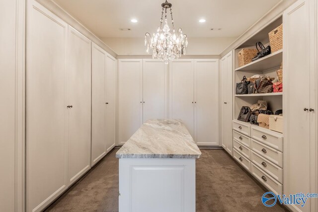 living area with an inviting chandelier, crown molding, and light tile patterned floors