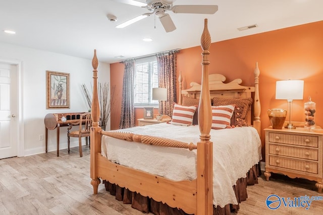 bedroom featuring ceiling fan and light hardwood / wood-style floors