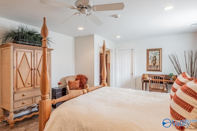 bedroom featuring hardwood / wood-style flooring and ceiling fan