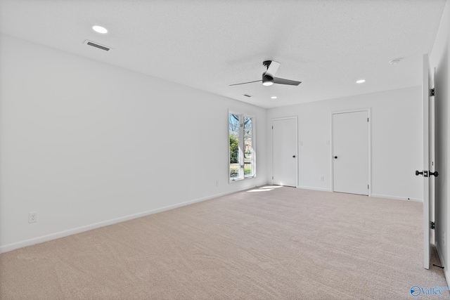 unfurnished bedroom with visible vents, ceiling fan, baseboards, carpet floors, and recessed lighting