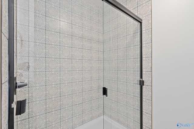 bathroom with a stall shower