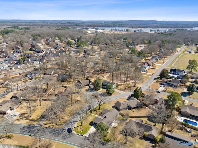 bird's eye view with a residential view and a water view