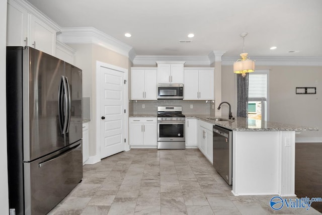 kitchen with pendant lighting, white cabinetry, stainless steel appliances, kitchen peninsula, and sink