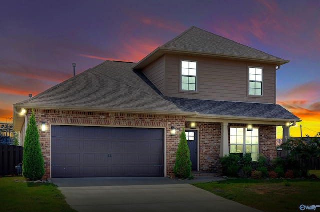 view of front of property featuring a garage