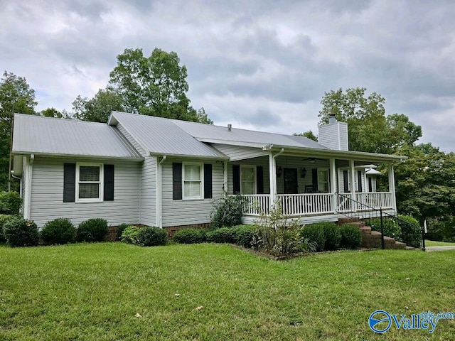 ranch-style house with a front lawn and a porch