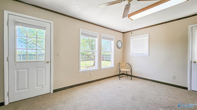 1411 W Washington St, Athens, AL 35611 - interior space with plenty of natural light, a ceiling fan, carpet flooring, and ornamental molding