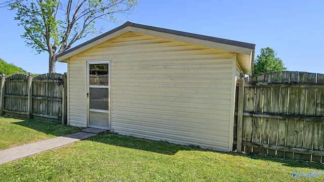 1411 W Washington St, Athens, AL 35611 - view of outbuilding with an outdoor structure, fence, and a gate
