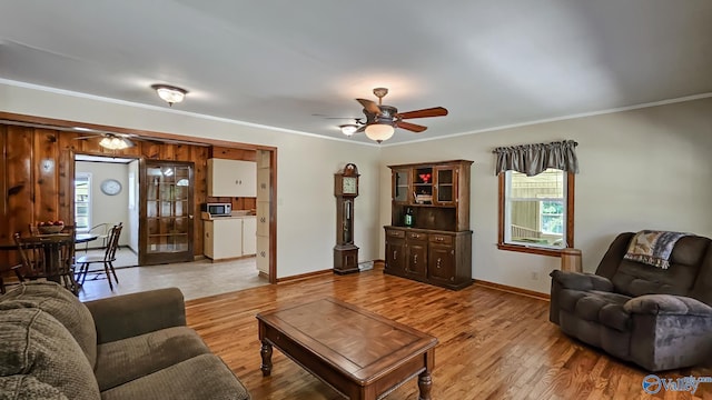 1411 W Washington St, Athens, AL 35611 - living area featuring a ceiling fan, baseboards, ornamental molding, and a wealth of natural light