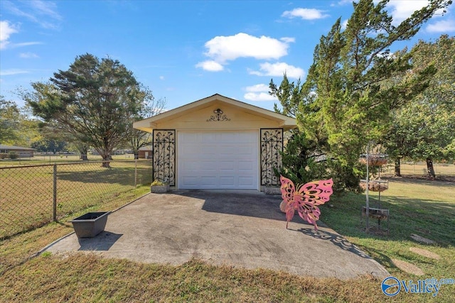 garage with a lawn