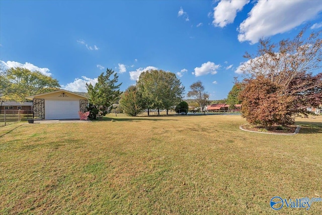 view of yard with a garage