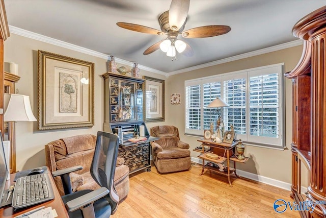 home office with light hardwood / wood-style floors, ornamental molding, and ceiling fan