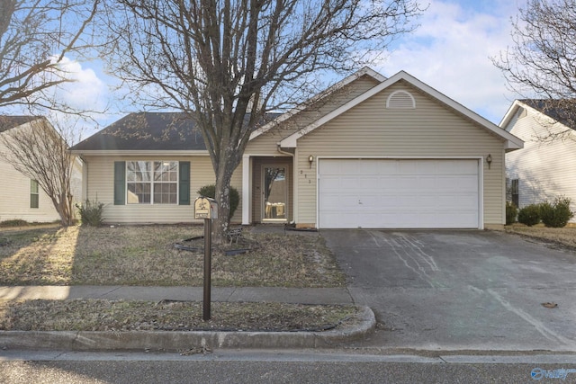 ranch-style home with a garage