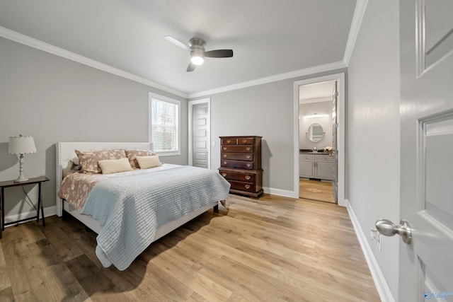 bedroom with wood-type flooring, connected bathroom, ceiling fan, and crown molding