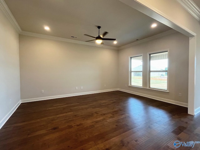 spare room featuring ornamental molding, dark hardwood / wood-style flooring, and ceiling fan