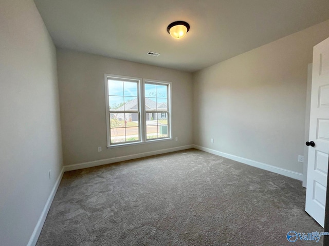 view of carpeted spare room