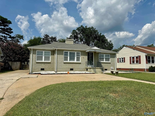 514 Marsheutz Ave SW, Huntsville, AL 35801 - ranch-style house featuring a chimney, crawl space, a front lawn, brick siding, and fence