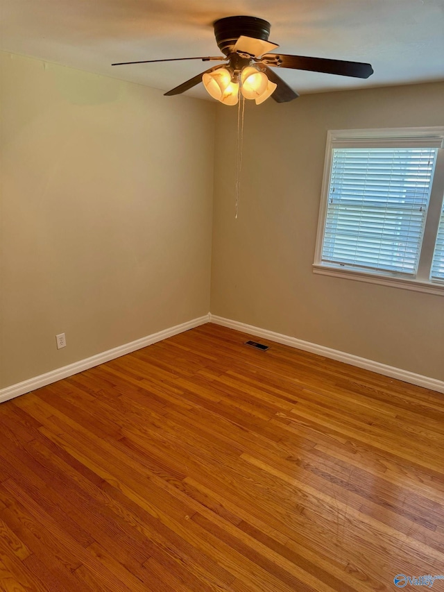514 Marsheutz Ave SW, Huntsville, AL 35801 - unfurnished room featuring light wood-style flooring, baseboards, and ceiling fan
