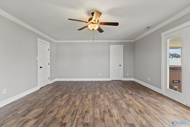 spare room with a textured ceiling, dark wood-type flooring, ceiling fan, and crown molding