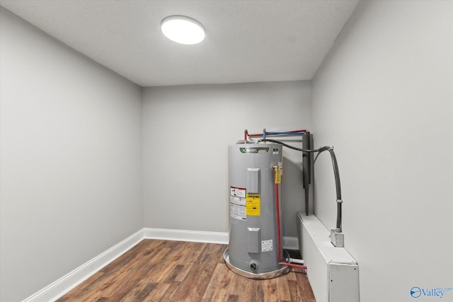 utility room featuring electric water heater