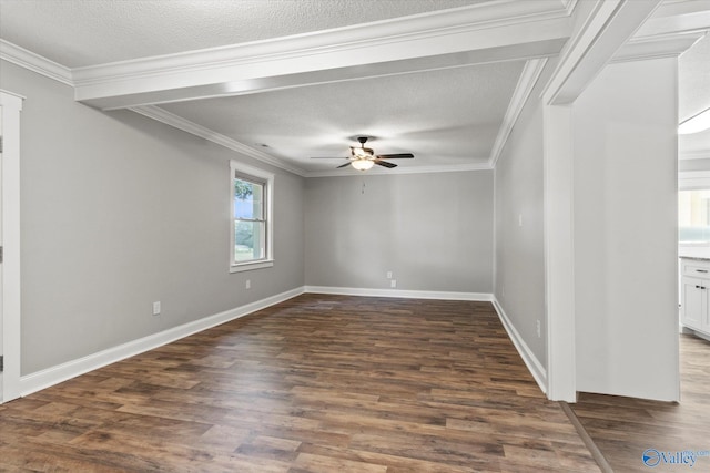 unfurnished room featuring a textured ceiling, ceiling fan, ornamental molding, and dark hardwood / wood-style flooring