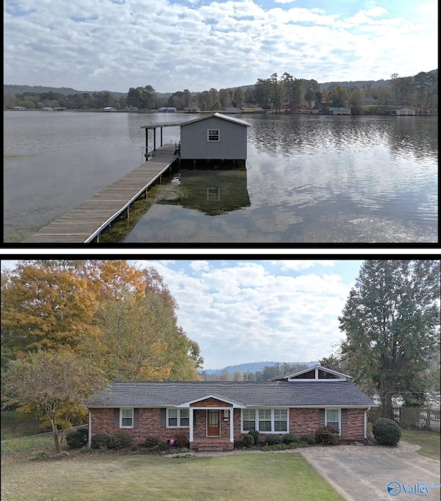 view of dock featuring a yard and a water view