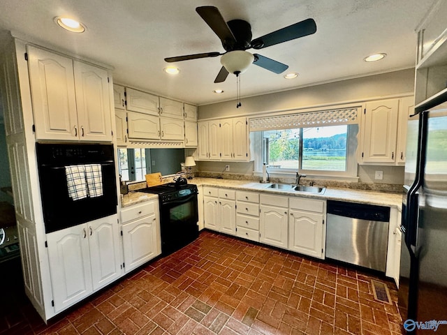 kitchen with ceiling fan, sink, white cabinets, and black appliances