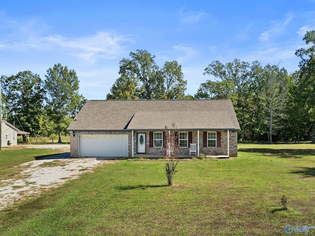 ranch-style house with driveway, a front lawn, an attached garage, and brick siding