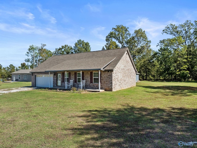 ranch-style home featuring a porch, a front lawn, an attached garage, and brick siding