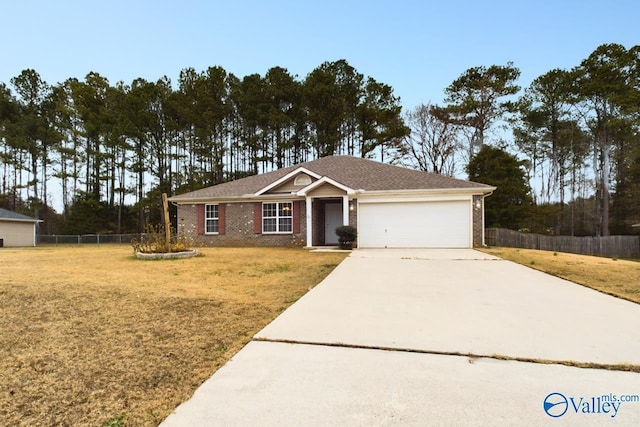 ranch-style house with a front lawn and a garage