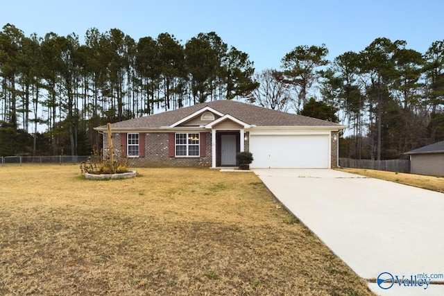 ranch-style home featuring a front yard and a garage