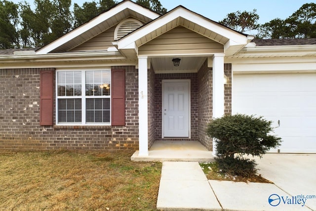 doorway to property featuring a garage