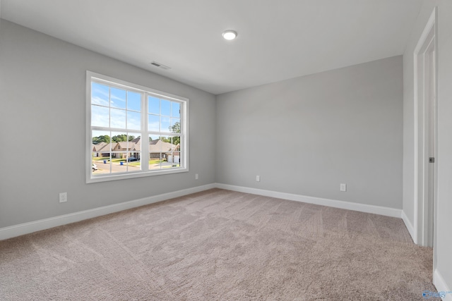 view of carpeted spare room