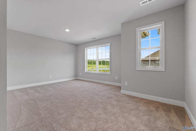 view of carpeted spare room