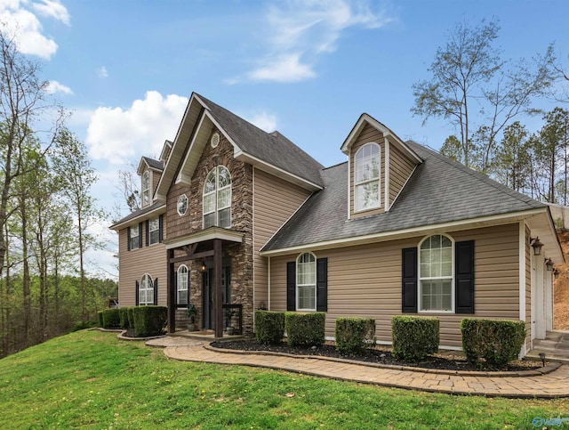 view of front of house with a front lawn