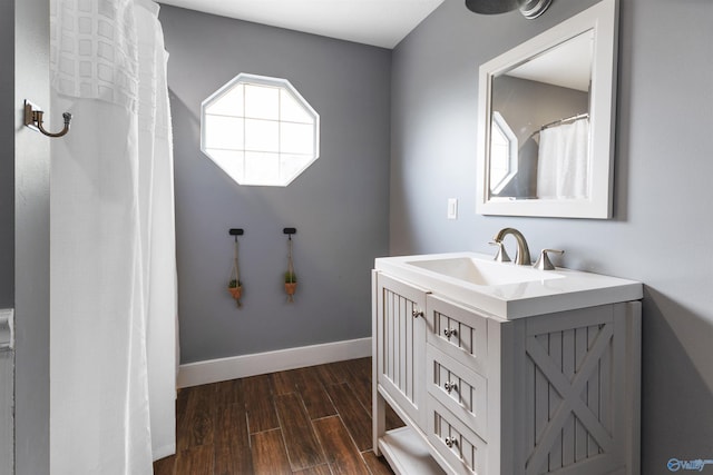 bathroom featuring vanity and hardwood / wood-style flooring