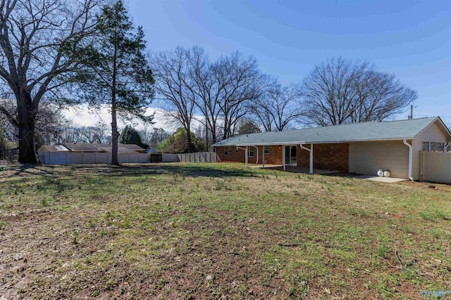 view of yard featuring a fenced backyard and a patio