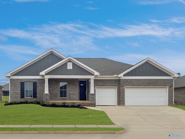 208 Fallow Cir, Madison, AL 35757 - craftsman-style home featuring driveway, a front yard, a garage, brick siding, and board and batten siding