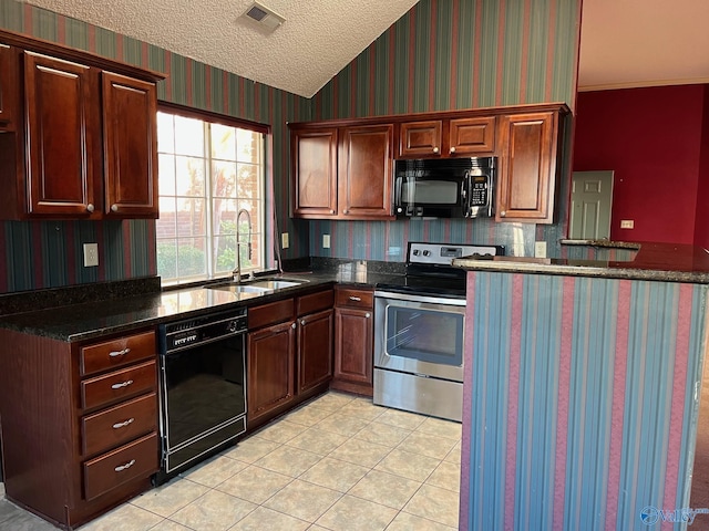 kitchen with sink, kitchen peninsula, a textured ceiling, light tile patterned floors, and black appliances