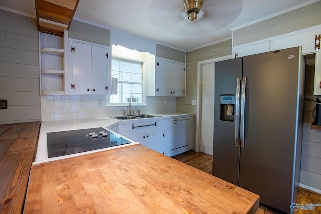 kitchen with stainless steel refrigerator with ice dispenser, black electric stovetop, open shelves, white cabinetry, and dishwasher