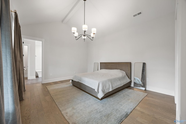 bedroom featuring an inviting chandelier, vaulted ceiling with beams, and wood-type flooring