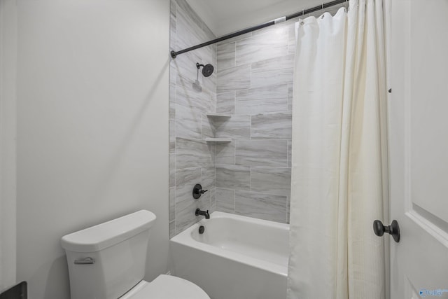 bathroom with shower / bath combination with curtain and toilet