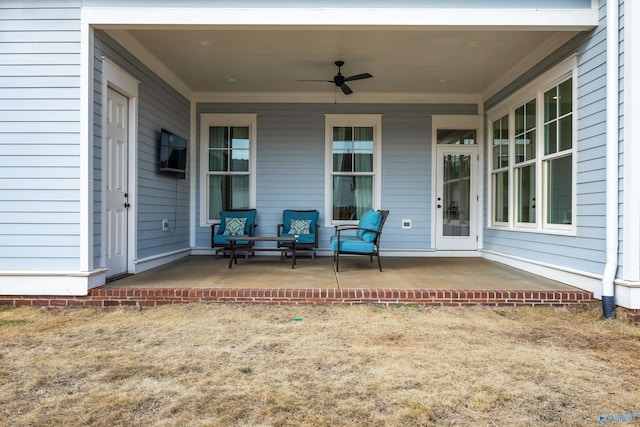 view of patio / terrace featuring ceiling fan