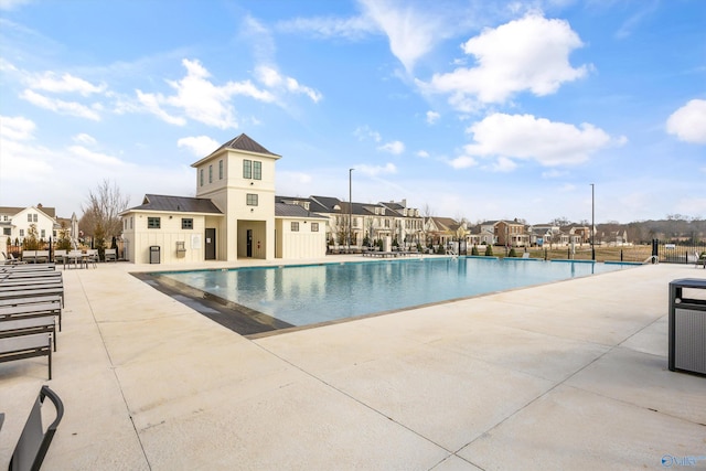 view of swimming pool featuring a patio area