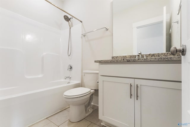 full bath featuring bathing tub / shower combination, vanity, toilet, and tile patterned floors